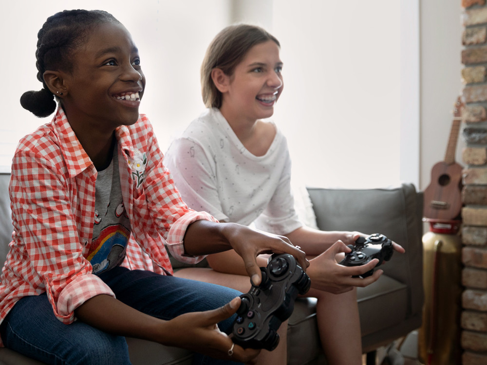 people sitting and enjoying game